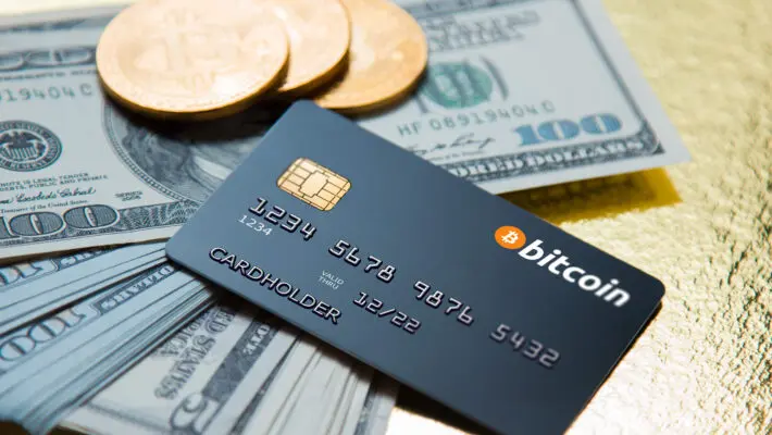 Concept,Bank,Card,Bitcoin,On,A,Golden,Background
