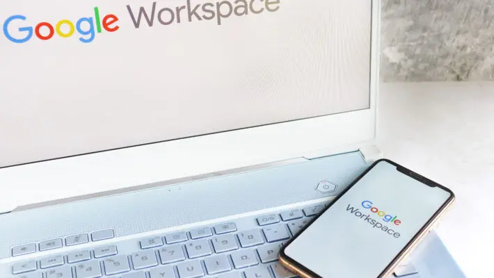 Google,Workspace,Logo,On,Computer,Screen,And,Google,Workspace,Logo