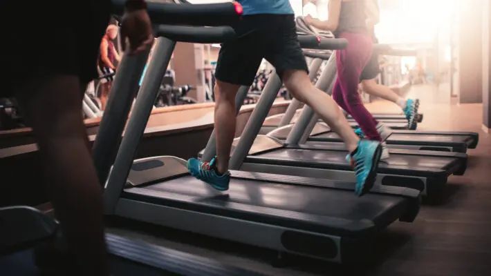 People,Running,In,Machine,Treadmill,At,Fitness,Gym,Club