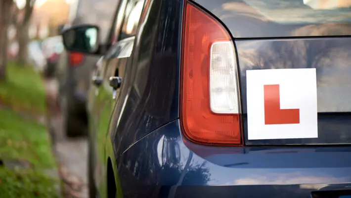 Laerner,Driver,’l’,Sign,At,The,Back,Of,A,Blue