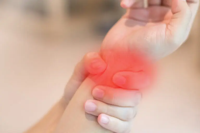 Wrist,Of,Office,Worker,Syndrome,With,Red,Spot,As,Pain