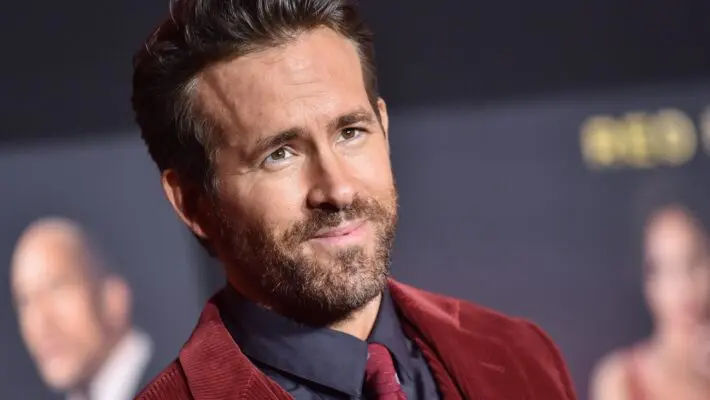 Deadpool star Ryan Reynolds has surprised a children's football team by donating £1,600 so they can buy a new kit.