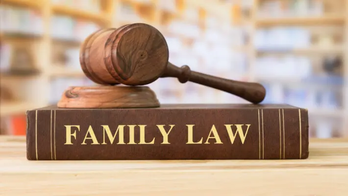 Family,Law,Books,With,A,Judges,Gavel,On,Desk,In