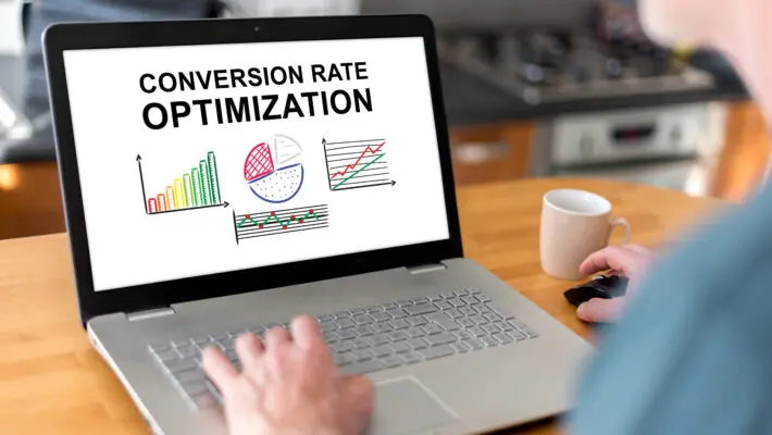 Man,Using,A,Laptop,With,Conversion,Rate,Optimization,Concept,On