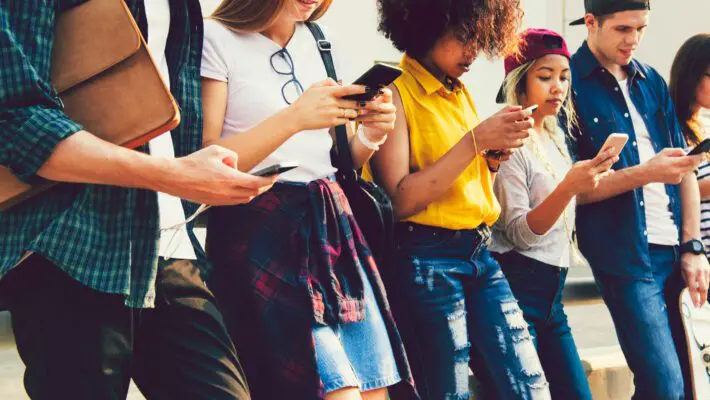 Diverse,Friends,Using,Their,Phones