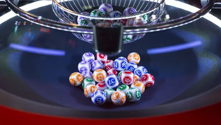 Colourful,Lottery,Balls,In,A,Rotating,Bingo,Machine.