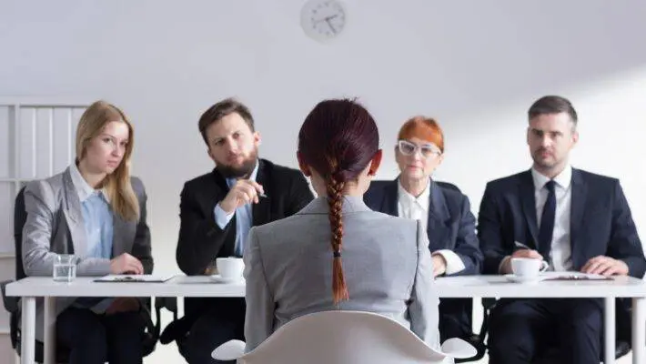 Woman,During,Job,Interview,And,Four,Elegant,Members,Of,Management