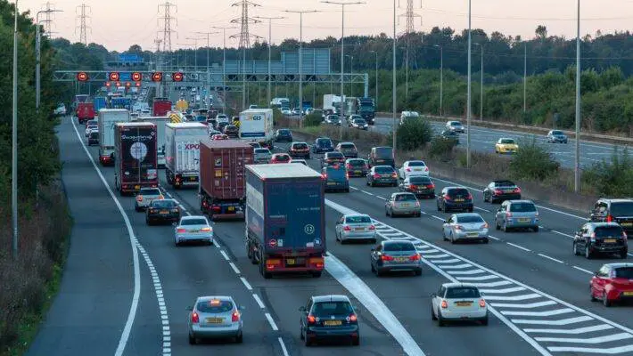 Delaying a ban on sales of new petrol and diesel cars could put drivers off switching to electric, the boss of the UK's motoring industry body has warned.