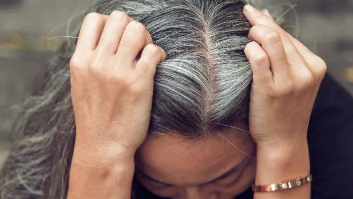 You're brushing your hair while looking in the mirror when you suddenly notice silver strands sneaking into your locks. It causes a lot of panic, and you don't want your gray hair to be visible.