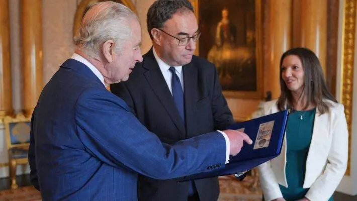 King Charles expressed surprise and gratitude on Tuesday as he became only the second reigning monarch to feature on British banknotes.