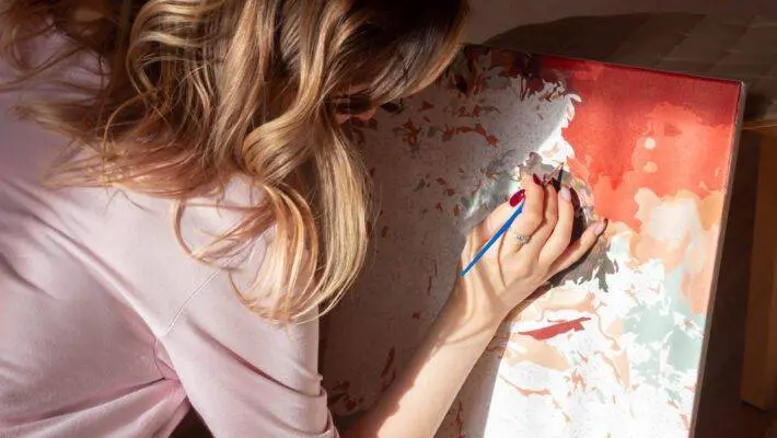 Paint by numbers is a fantastic way to dip your toes into the world of painting without the stress of freehand drawing. This method is like a coloring book for adults but with paint.