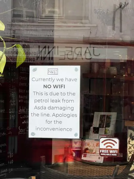 Nest Cafe Bramley sign showing that due to the petrol leak they have no broadband