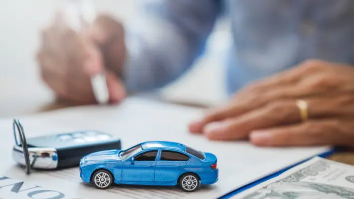 If you need a car but can’t pay for it upfront, you have two main options: take out a personal loan or get car finance.