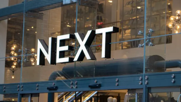 Next has become only the fourth UK retailer in history to post annual pre-tax profits exceeding £1 billion, joining the ranks of Tesco, Marks & Spencer, and Kingfisher.
