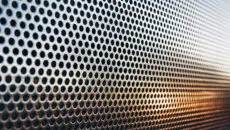 Perforated metal has long been valued for its strength, versatility, and clean visual appeal. Created by punching patterns of holes into metal sheets, it offers a practical balance between airflow, light control, and structural support.
