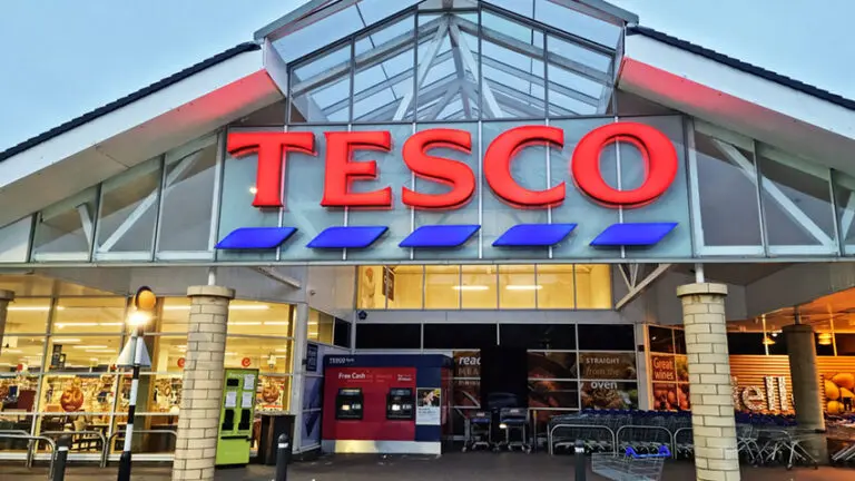 A washout spring has done more damage to Britain's supermarket tills than any World Cup win, according to the boss of Tesco, after the country's biggest retailer saw UK sales growth more than halve over a quarter blighted by rain and the fallout from the Middle East conflict.