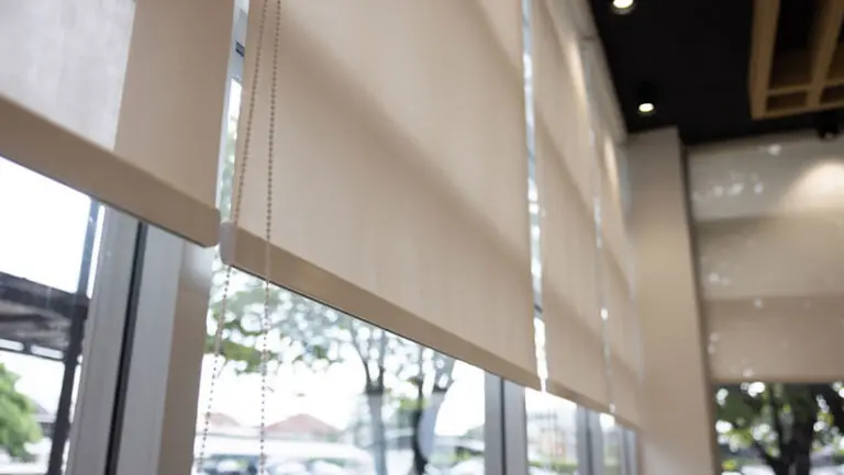 Roller blinds rank among the most popular window treatments in British homes, and it's easy to see why—they're neat, practical, and available in a near-endless range of fabrics. But the fabric you choose for a bedroom window shouldn't be the same one you pick for a living room.