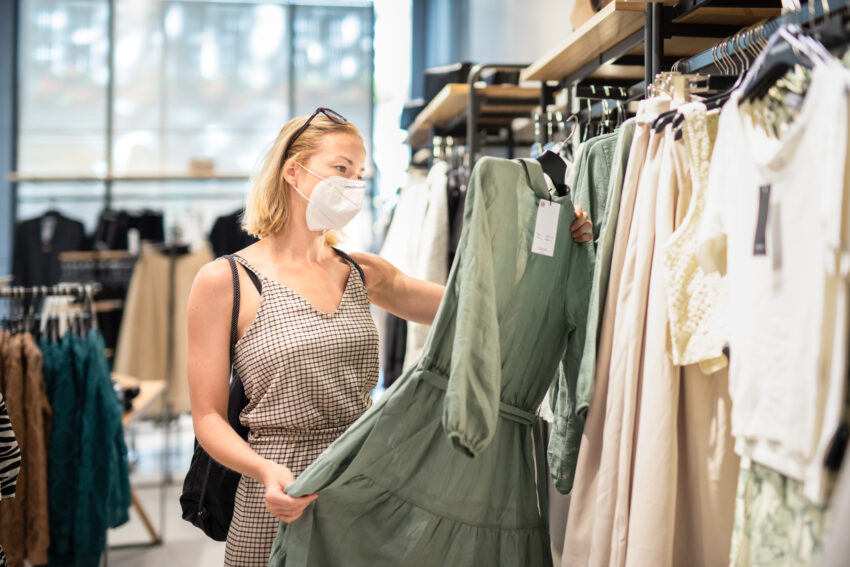 Ranges of clothes inside the shop at the opening day of the new