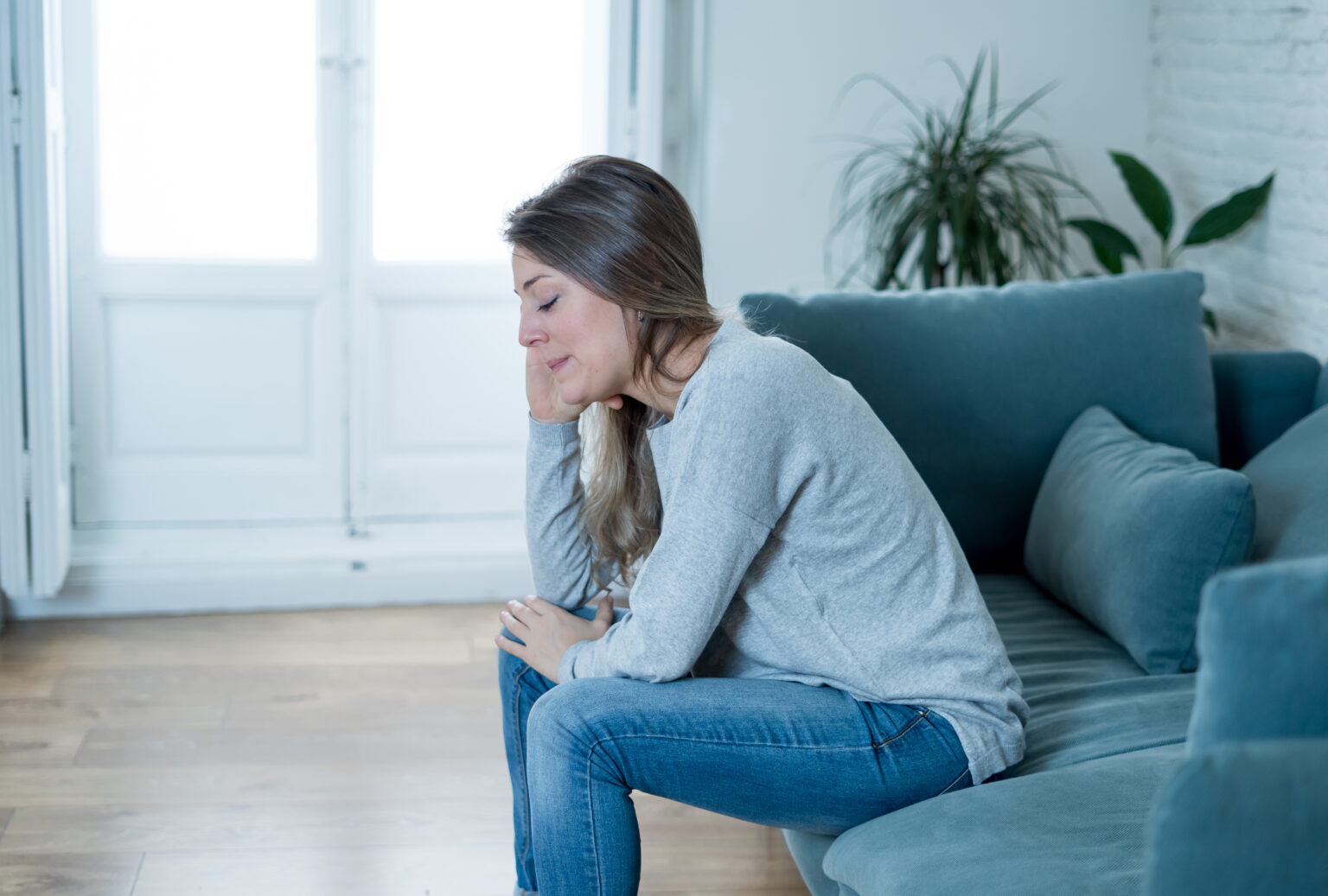 Feel at home. Woman unhappy in the Room.