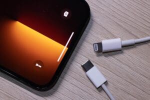 The European parliament has voted to introduce a single charging port for mobile phones, tablets and cameras by 2024 in a move that presents difficulties for Apple, whose iPhones use a different power connector.