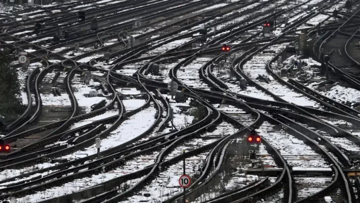 Train strikes, a cold snap and snowy conditions have kept workers and shoppers from city centres this week, emptying out high streets and office buildings, figures show.