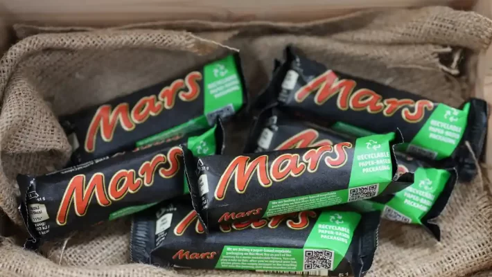 Consumers buying Mars bars at Tesco in the coming days will notice a change: the chocolate bar’s usual plastic wrapper has been swapped for a more environmentally friendly paper one.
