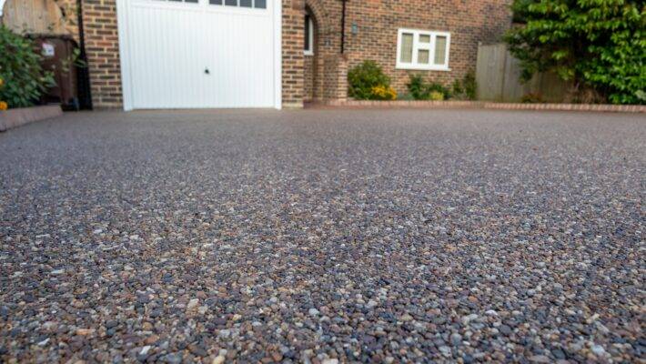 Resin-bound driveways have become a very popular choice of driveway option for many modern homes, whether they’re being used as part of a new build or replacing the old driveway that the property used to have.