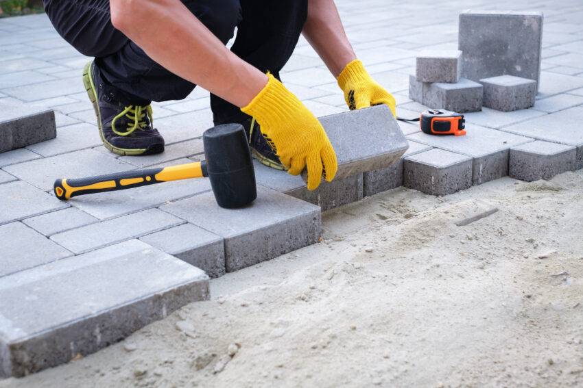 Imagine stepping outside into your own backyard oasis. As you walk across the smooth stone pathway, running your fingers along the natural ridges of the sandstone pavers, you feel a sense of harmony with nature.