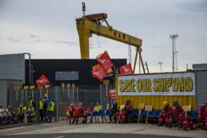Northern Ireland's economy faces uncertainty as Airbus acquires part of Spirit AeroSystems' Belfast plant, raising job security concerns, while shipbuilder Harland & Wolff seeks a £200m government loan guarantee. Unions and politicians demand protection for local jobs.