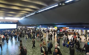 Euston railway station has switched off its giant advertising billboard after an outcry from commuters who criticised the replacement of vital passenger information screens.