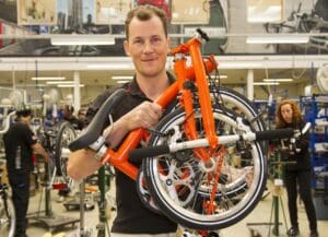 Brompton Bicycle’s profit before tax plunges below the cost of its top-end folding bike amid a 5% dip in sales, rising costs, and industry-wide challenges. Learn how the British bike maker is responding with premium models and expansion plans.